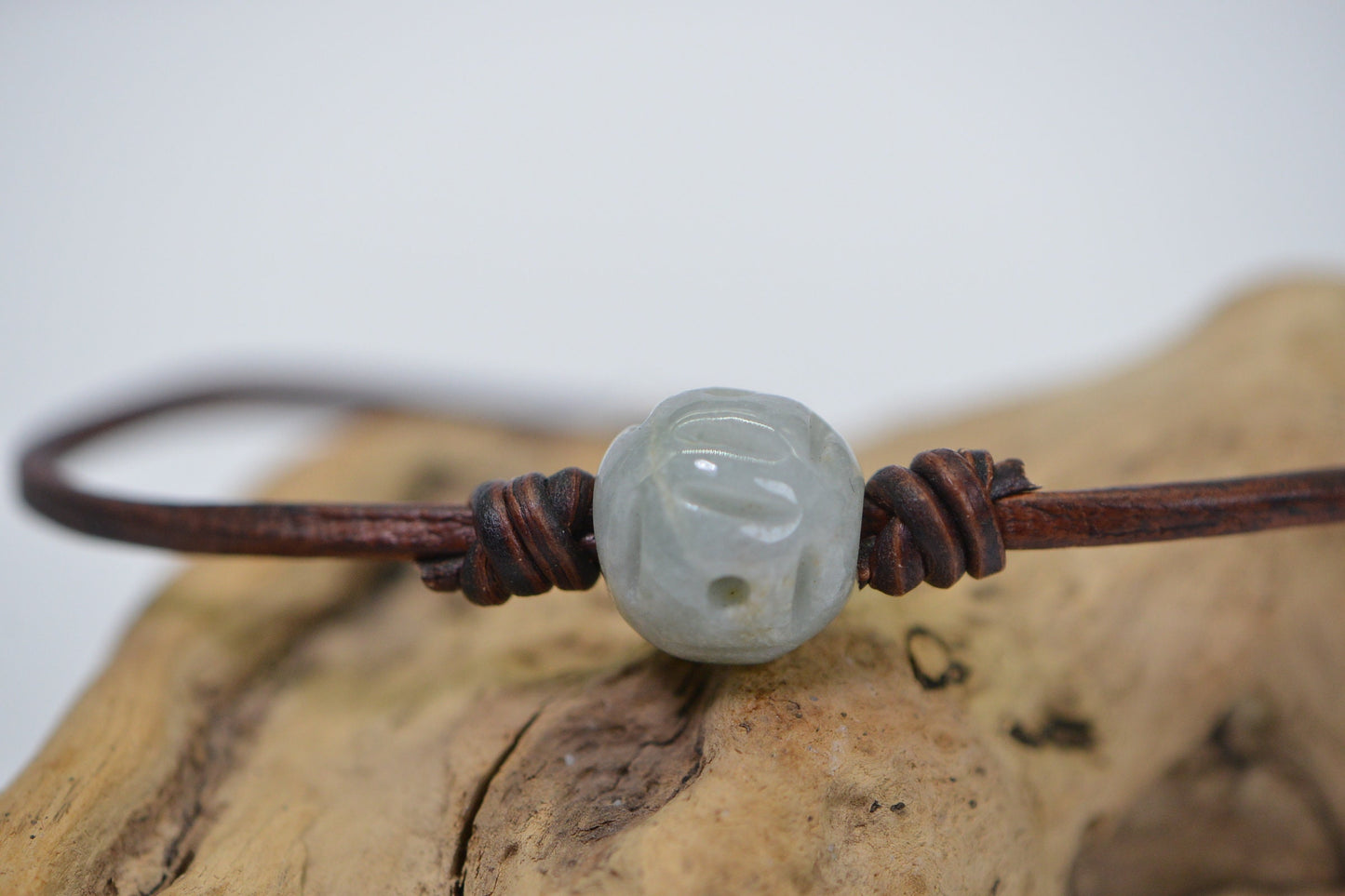 Burma Green Jade Lotus Bracelet: Carved Bead on Leather Cord