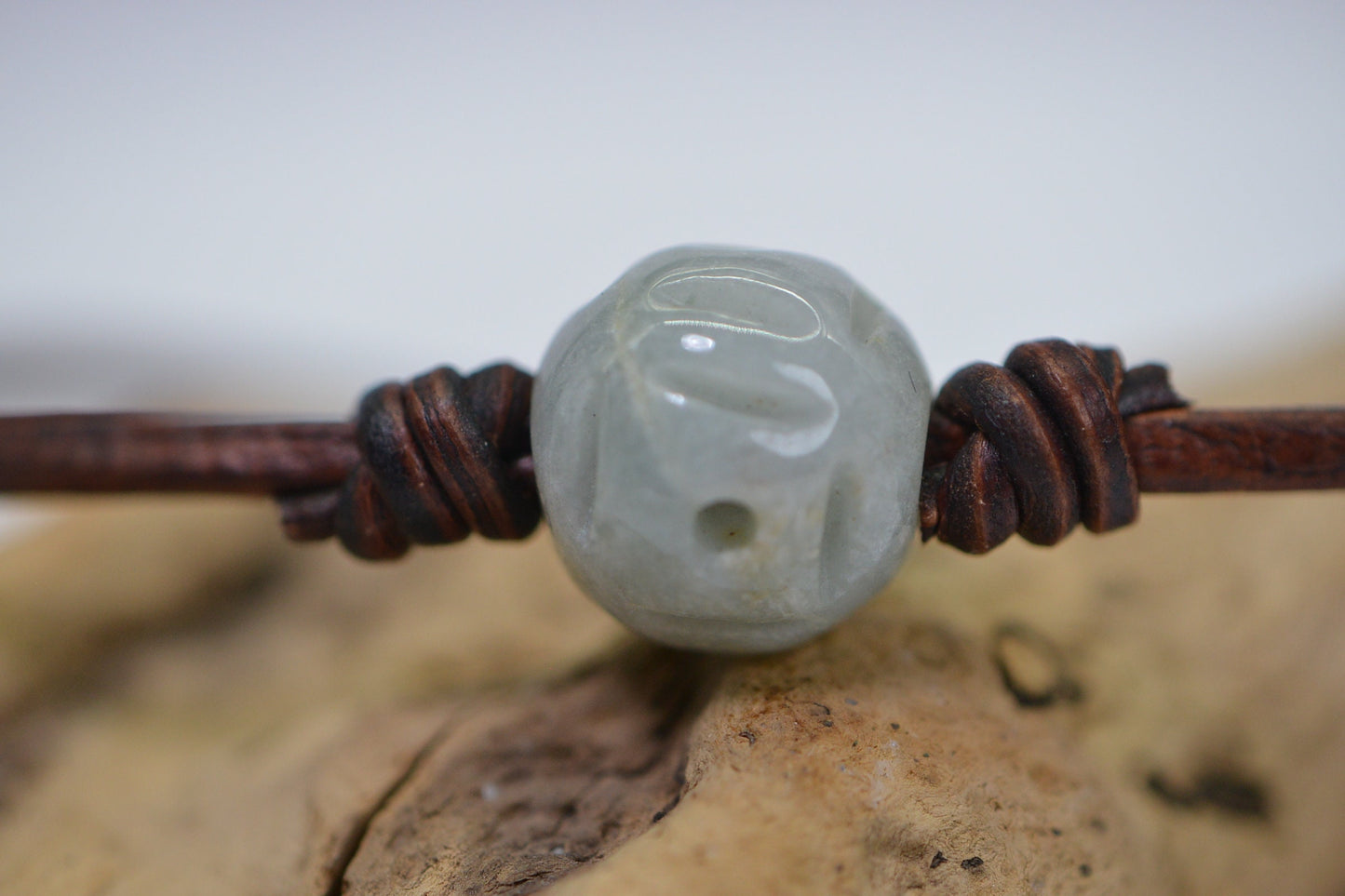 Burma Green Jade Lotus Bracelet: Carved Bead on Leather Cord