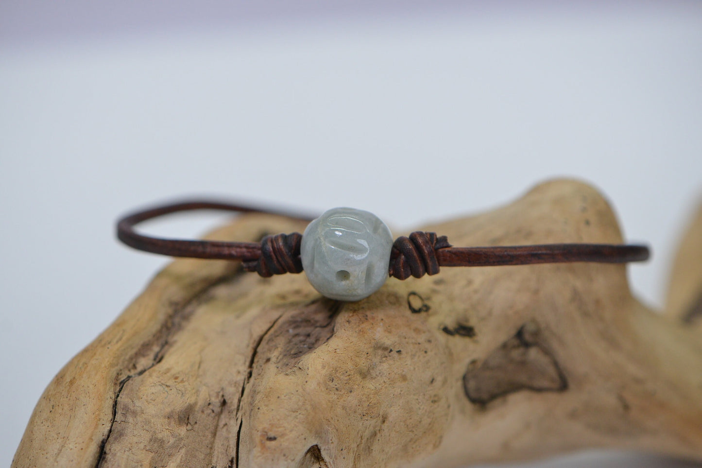 Burma Green Jade Lotus Bracelet: Carved Bead on Leather Cord