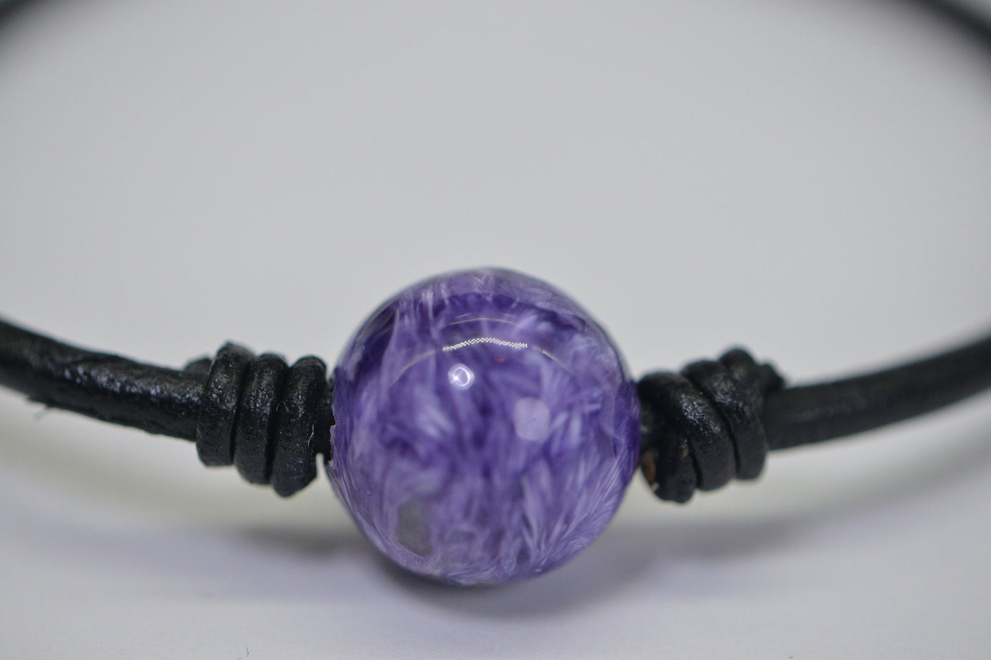 Natural Charoite Leather Cord Bracelet: Sterling Silver Clasp