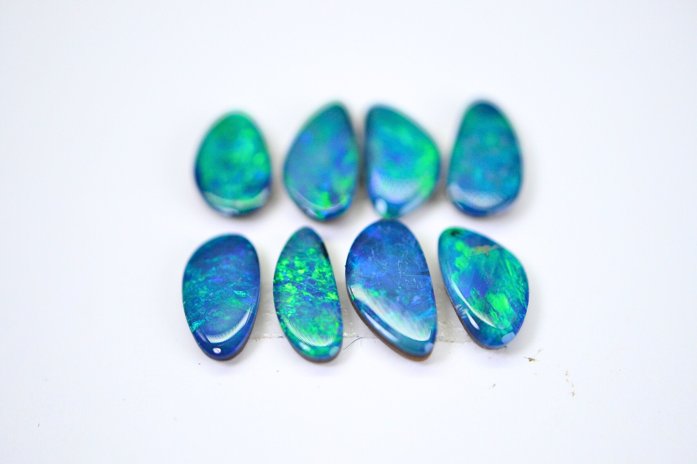 Australian Black Opal Doublet Lot: Metallic Blue Green Freeform Stones