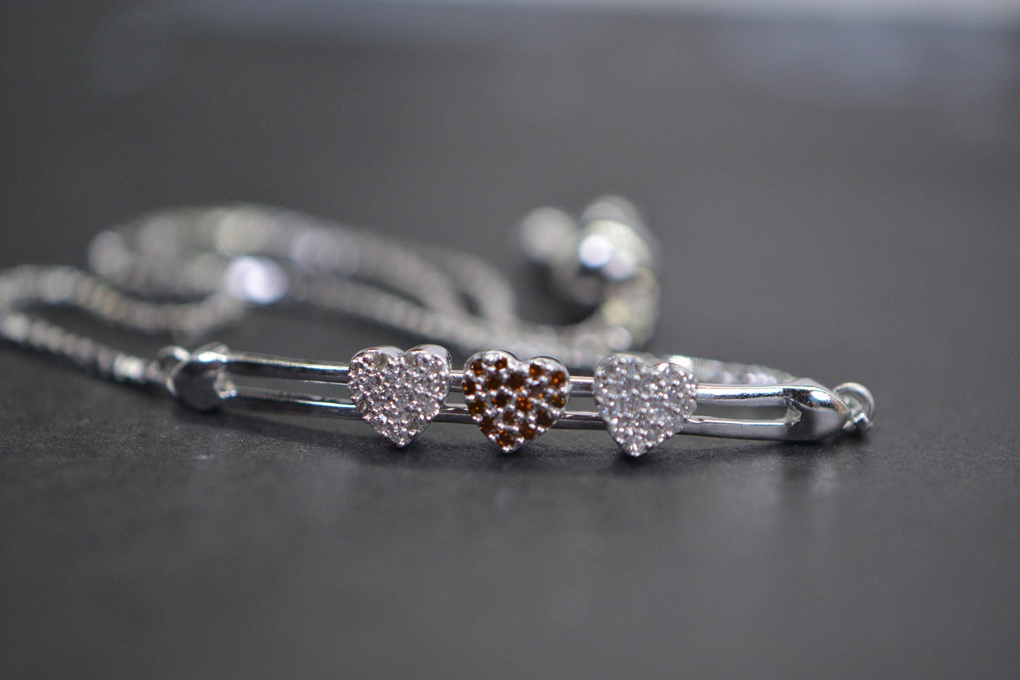 Diamond Three Heart Bracelet: 14k White Gold over Sterling Silver