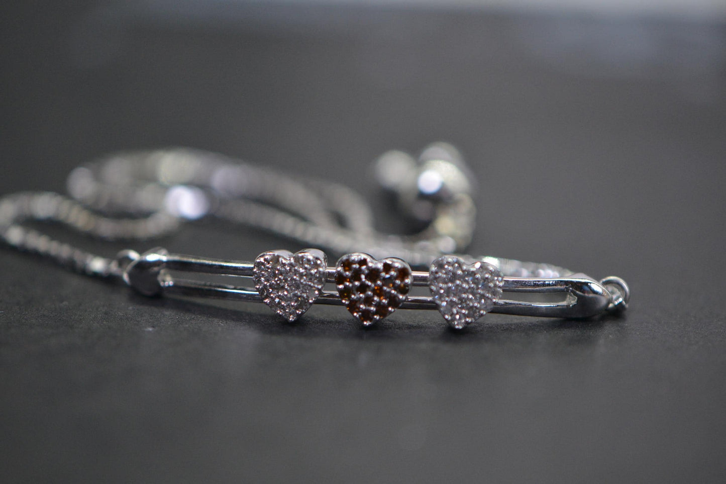 Diamond Three Heart Bracelet: 14k White Gold over Sterling Silver