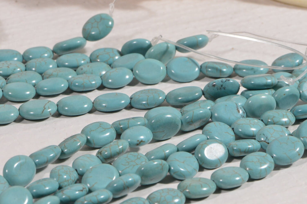 Dyed Magnesite Bead Strand: Greenish Blue Oval Cabochons