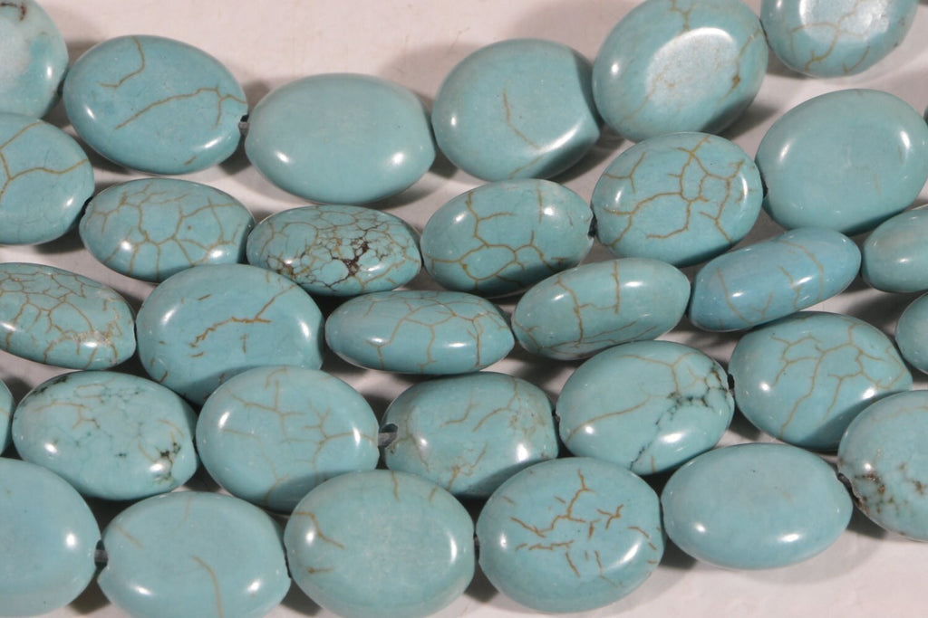Dyed Magnesite Bead Strand: Greenish Blue Oval Cabochons