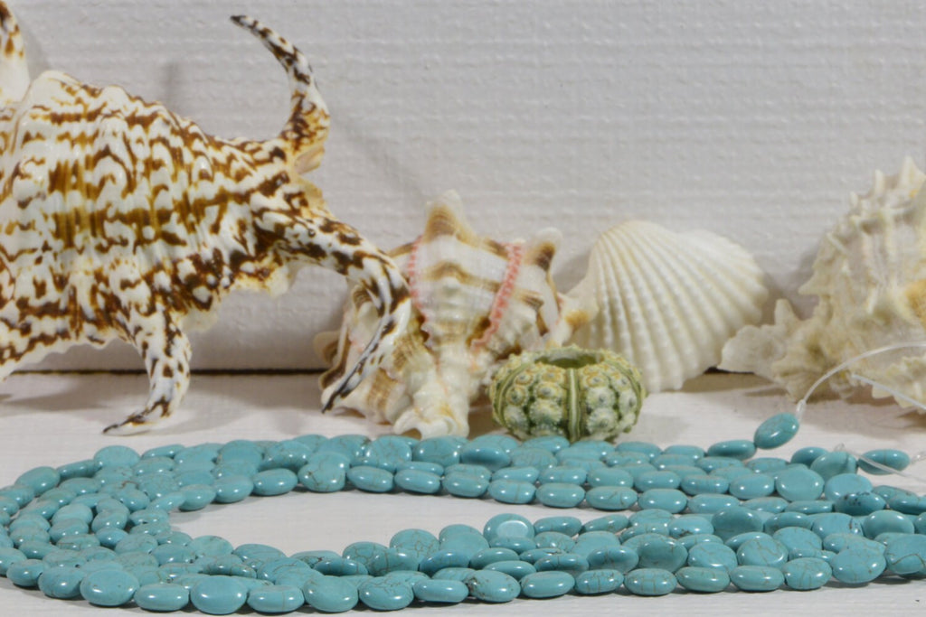 Dyed Magnesite Bead Strand: Greenish Blue Oval Cabochons