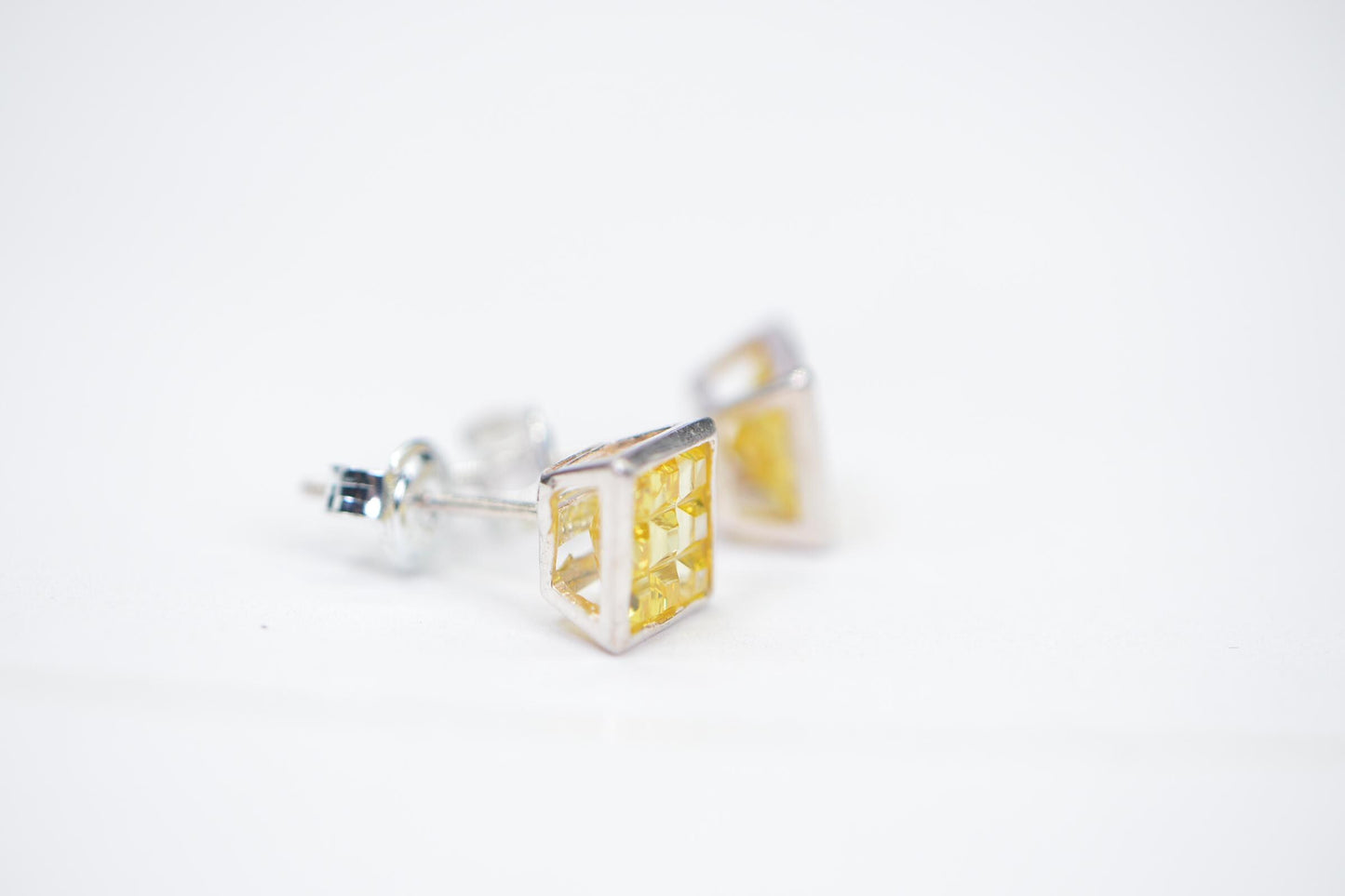 Yellow Crystal Princess Cut Stud Earrings: 14K White Gold Over Sterling Silver