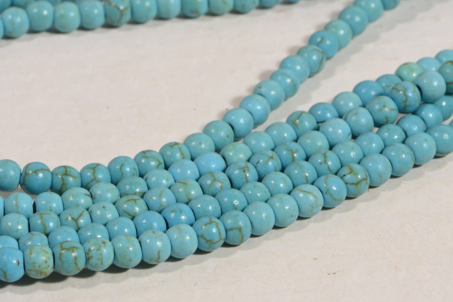 Dyed Magnesite Beads: 4mm Light Sky Blue Round Gemstone Beads