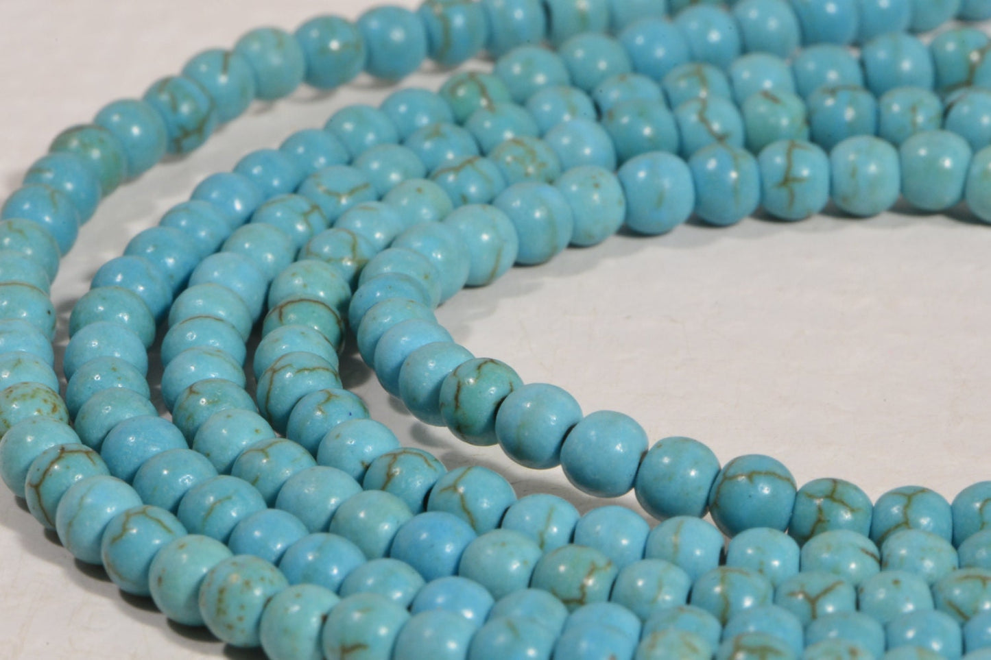Dyed Magnesite Beads: 4mm Light Sky Blue Round Gemstone Beads