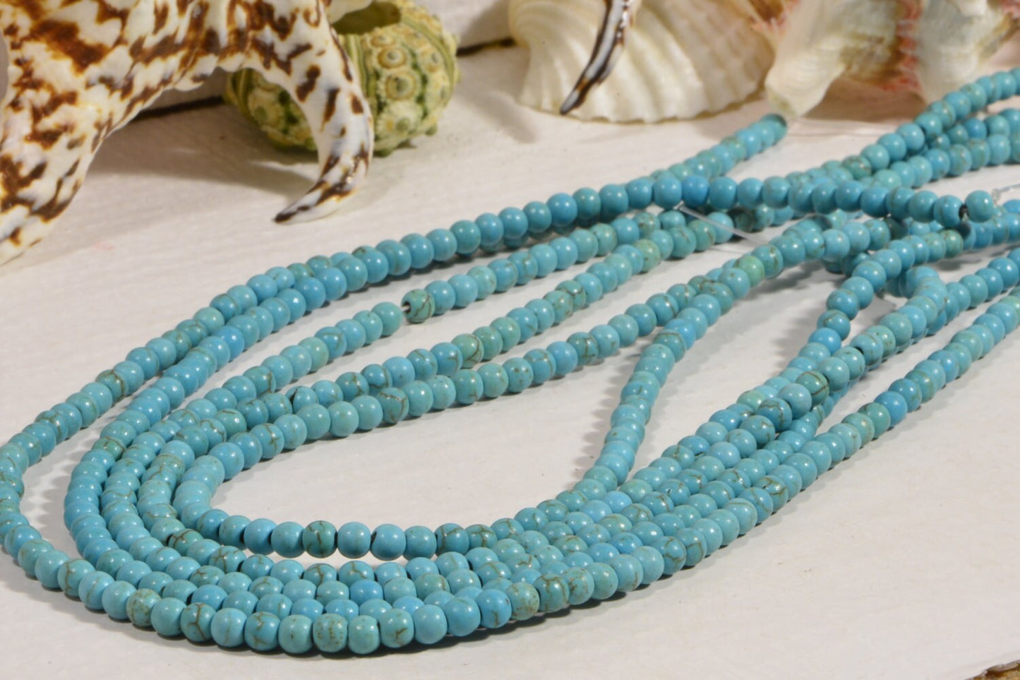 Dyed Magnesite Beads: 4mm Light Sky Blue Round Gemstone Beads