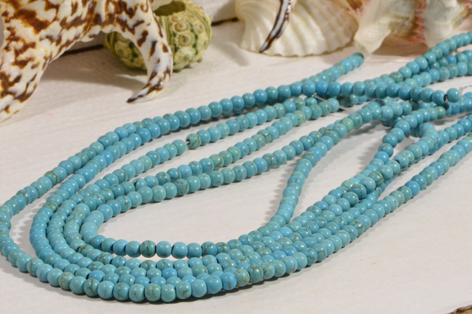 Dyed Magnesite Beads: 4mm Light Sky Blue Round Gemstone Beads