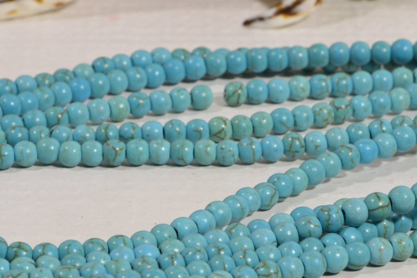 Dyed Magnesite Beads: 4mm Light Sky Blue Round Gemstone Beads