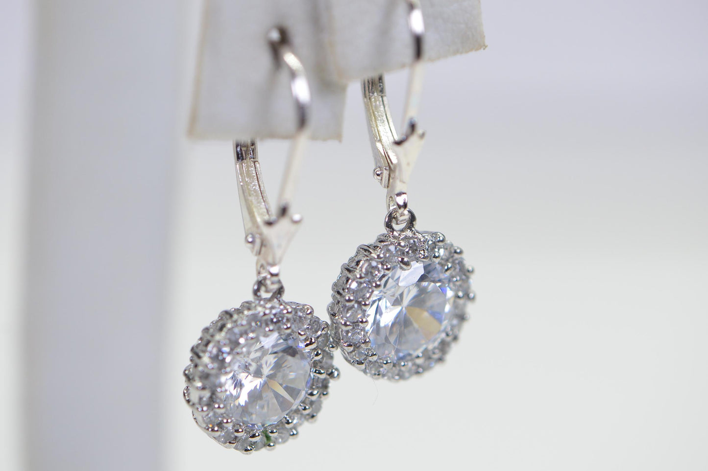 Halo Simulated Diamond Dangle Earrings: 14K Gold Sterling Silver