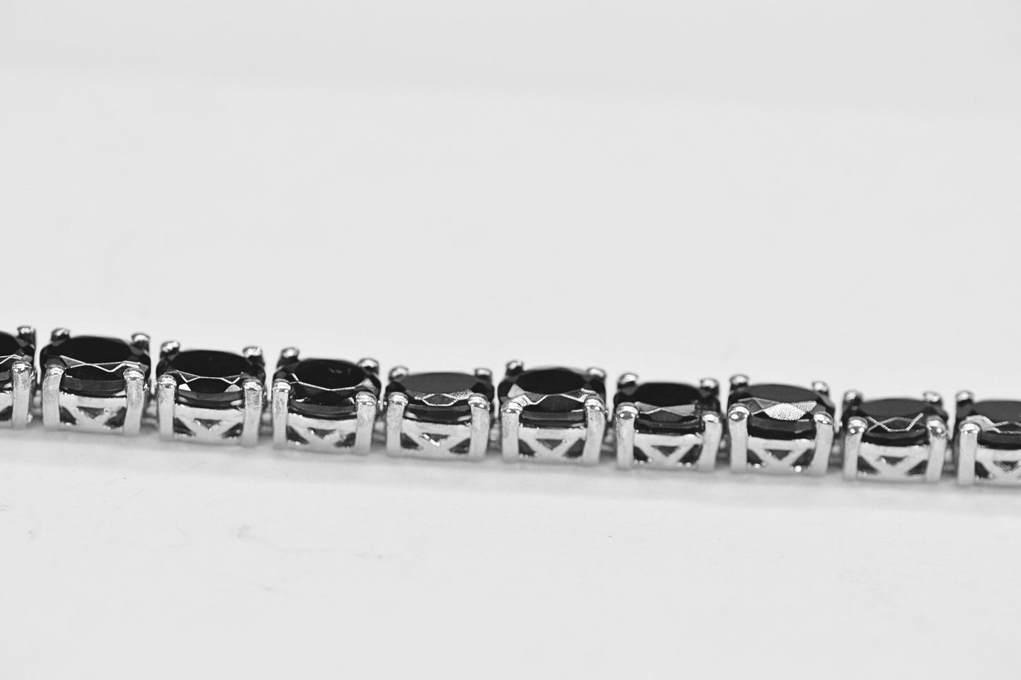 Oval Black Diamond Tennis Bracelet: Sterling Silver Rhodium Finish, 6.75 in