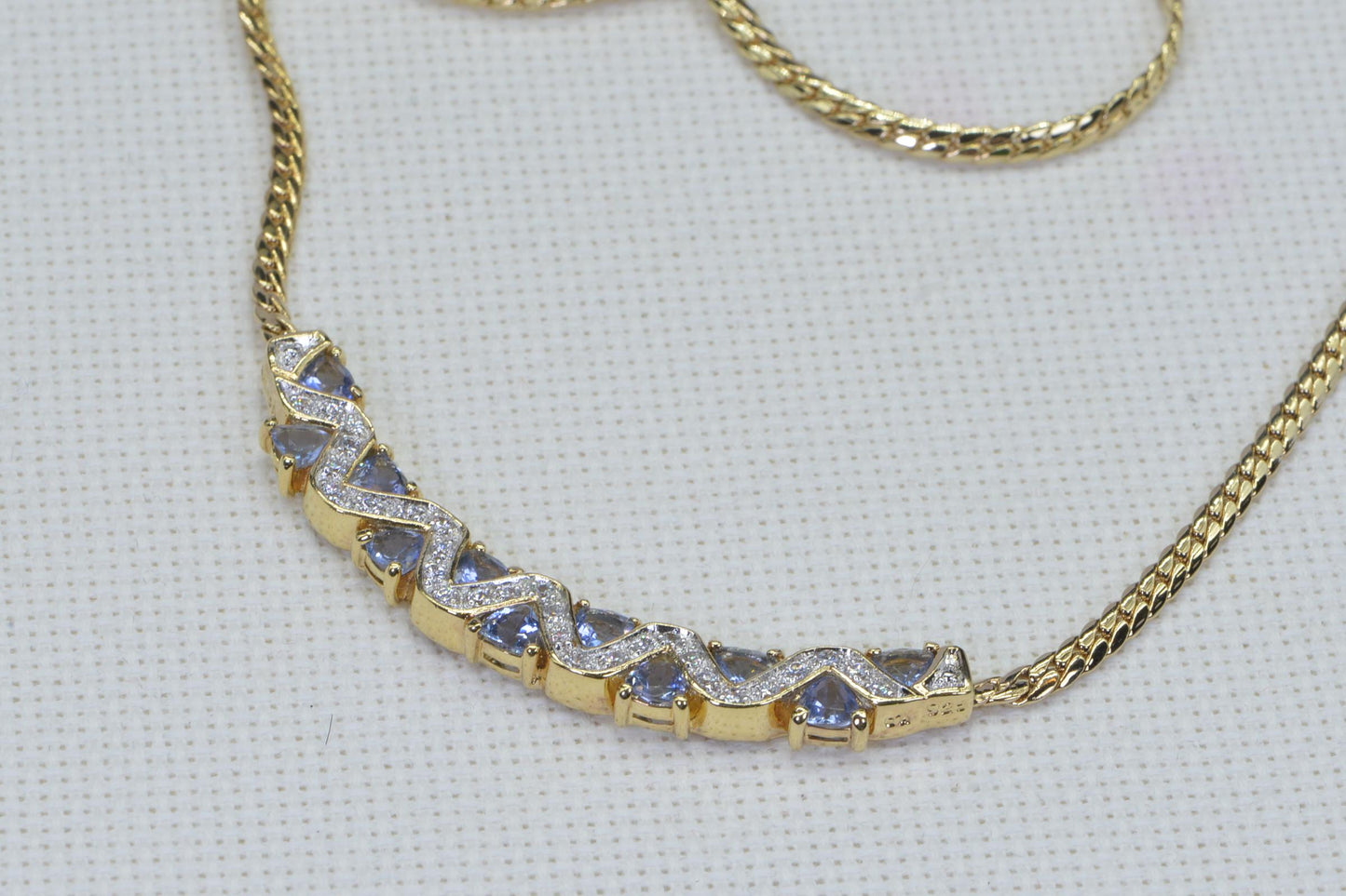 Simulated Tanzanite Necklace: 14K Gold Over Sterling Silver, Herringbone Chain