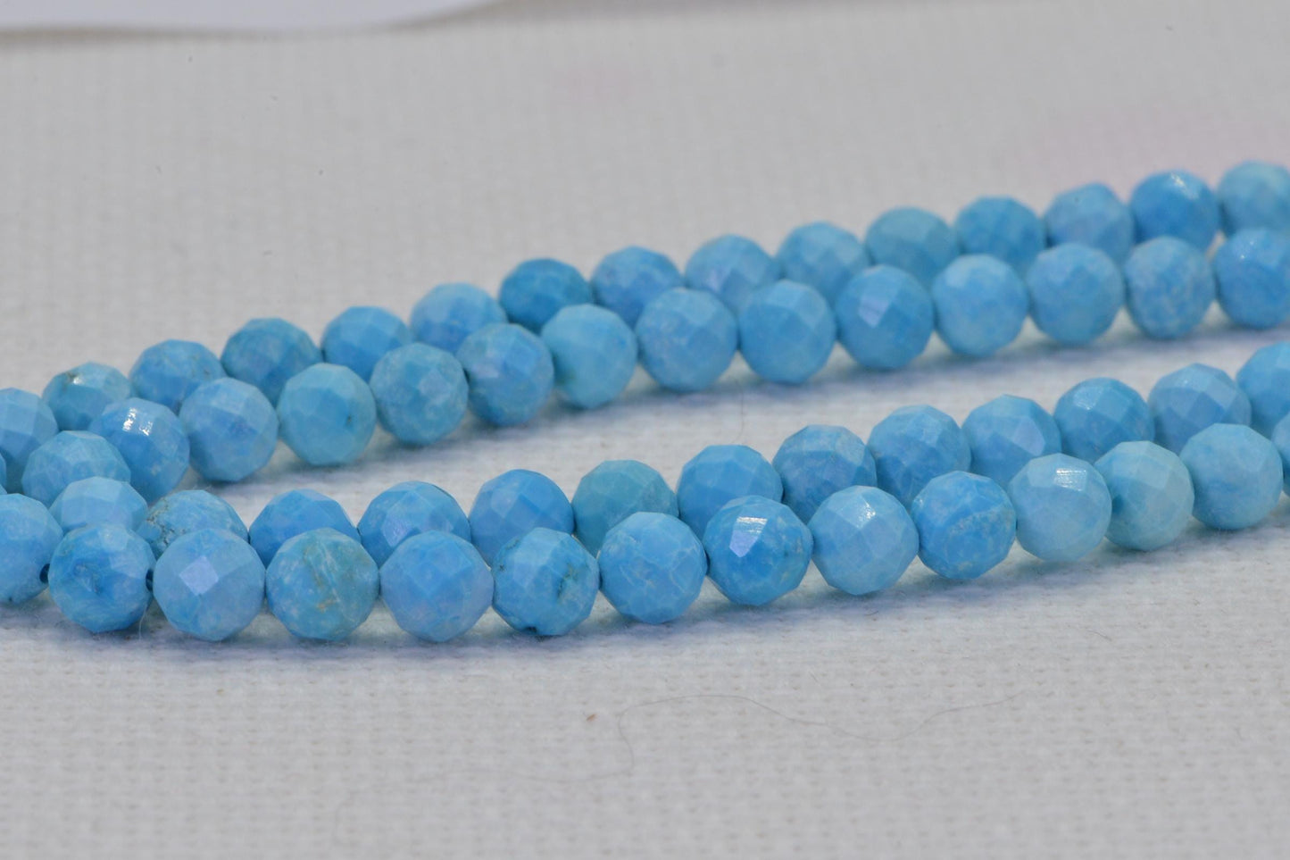 Sleeping Beauty Turquoise Beads: 5mm Faceted Round, 15 Inch Strand