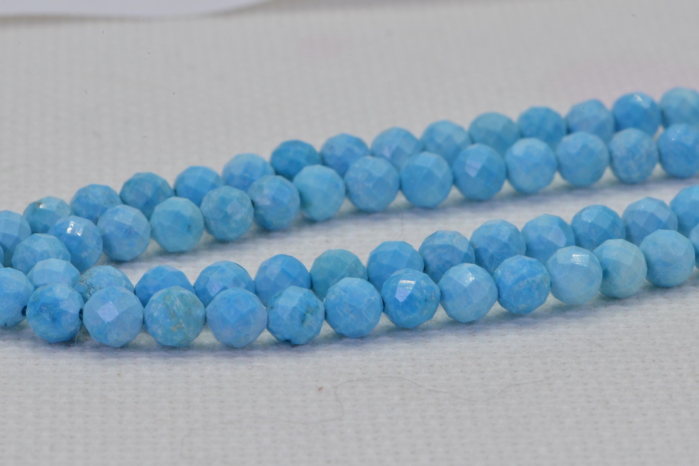 Sleeping Beauty Turquoise Beads: 5mm Faceted Round, 15 Inch Strand