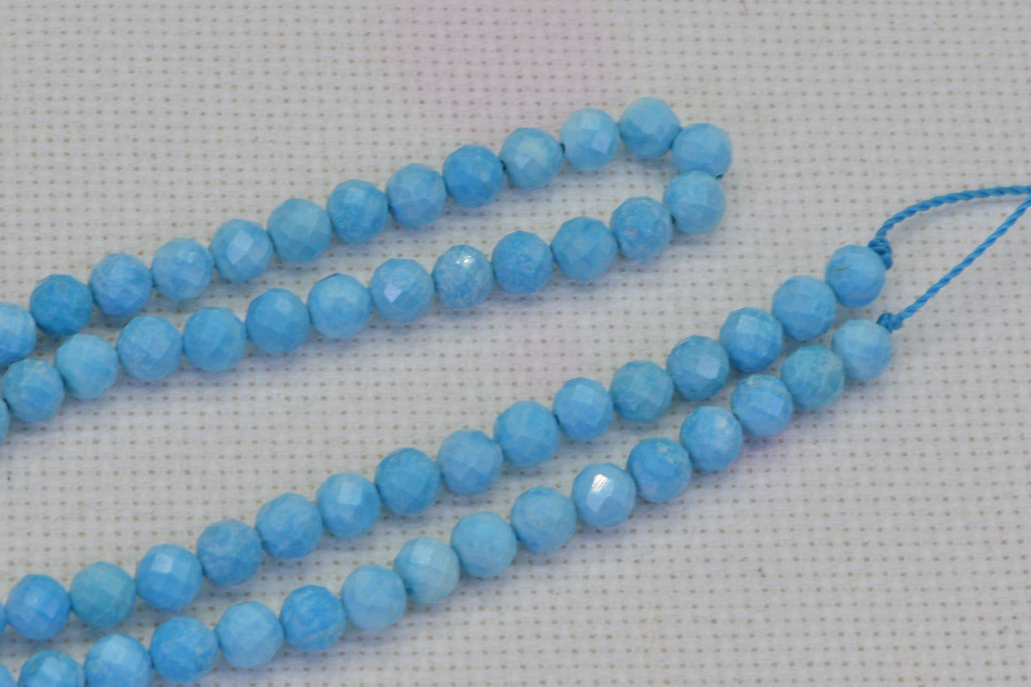 Sleeping Beauty Turquoise Beads: 5mm Faceted Round, 15 Inch Strand