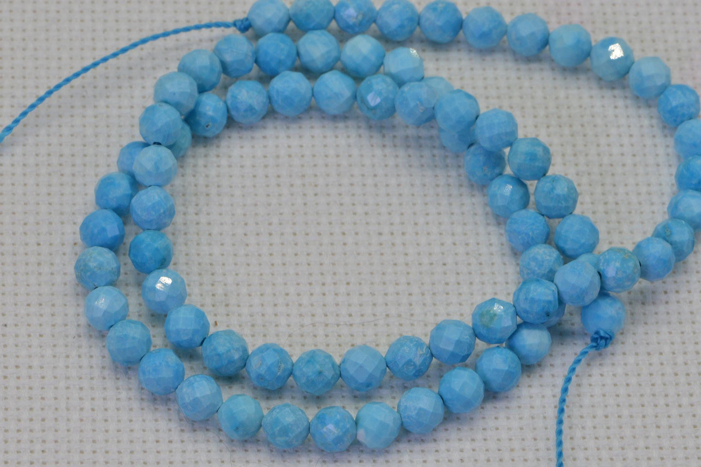 Sleeping Beauty Turquoise Beads: 5mm Faceted Round, 15 Inch Strand