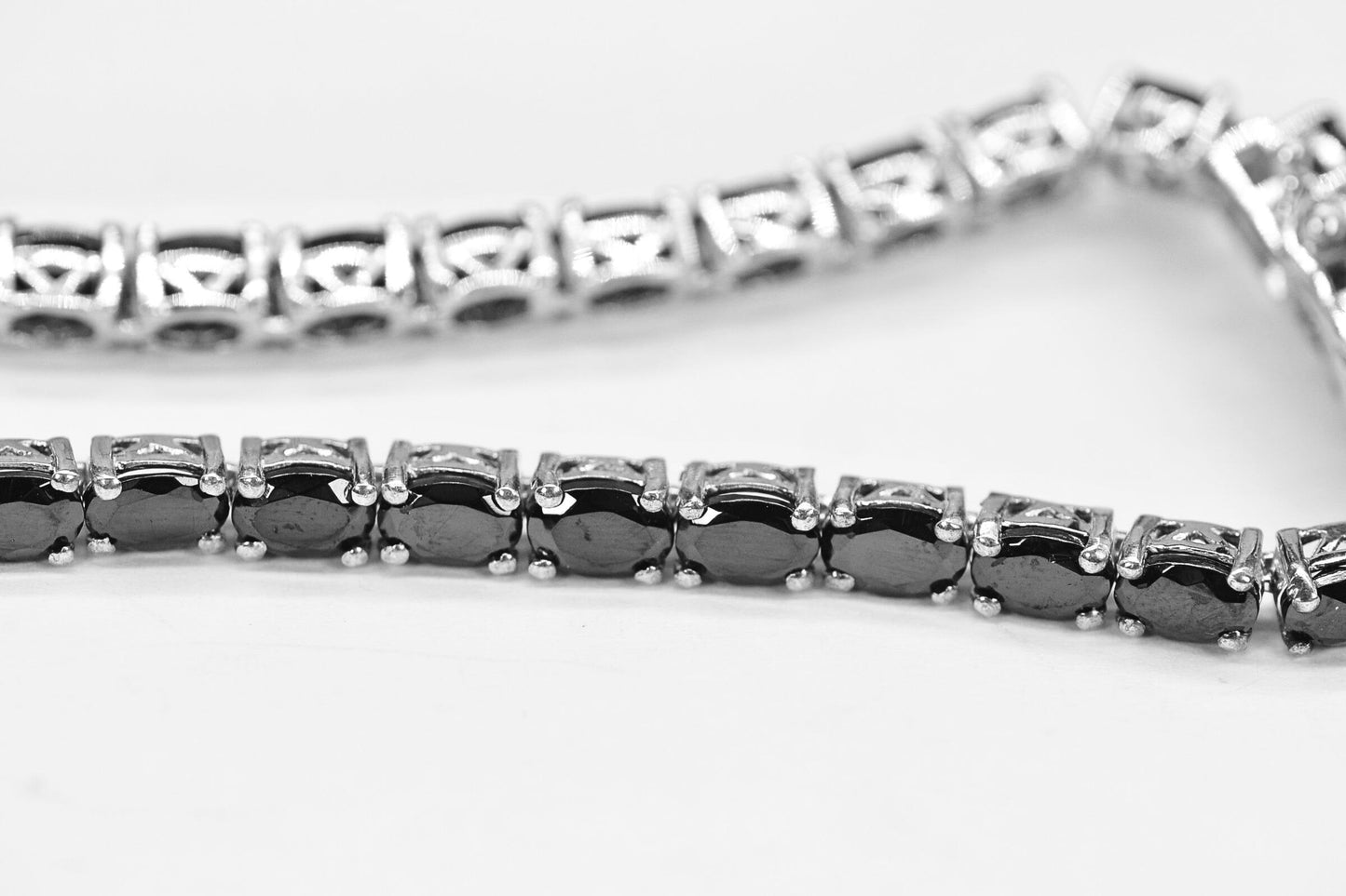 Oval Black Diamond Tennis Bracelet: Sterling Silver Rhodium Finish, 6.75 in