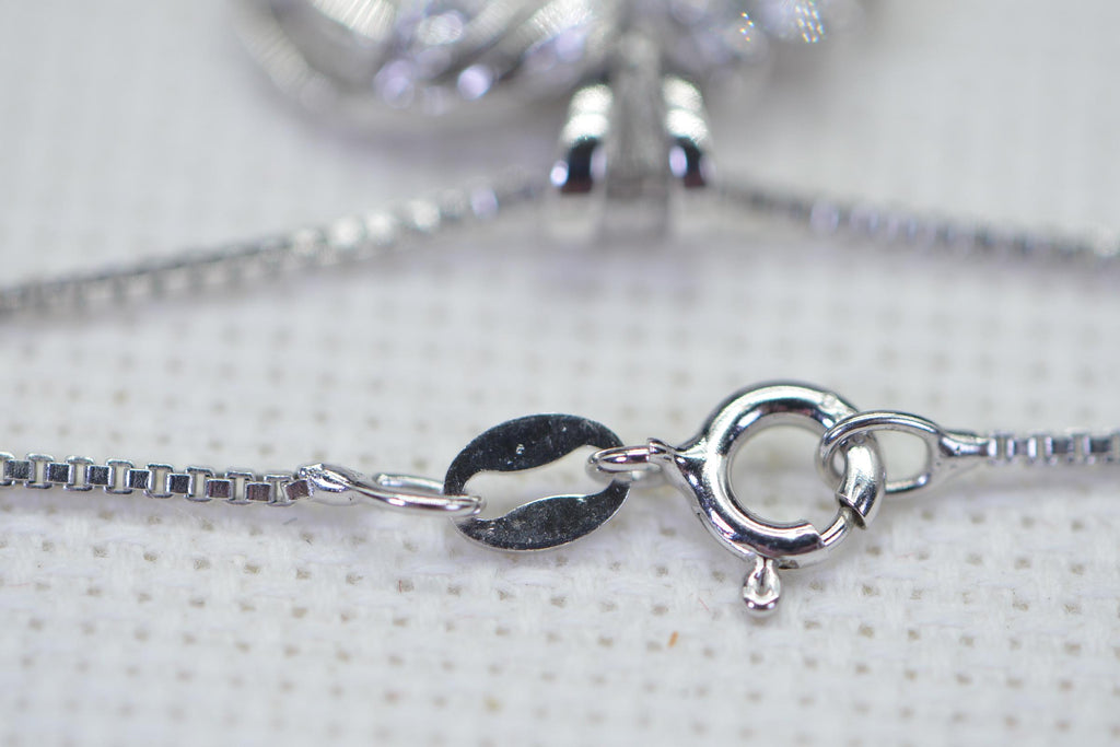 CZ Heart Pendant: 14K White Gold Over Sterling Silver