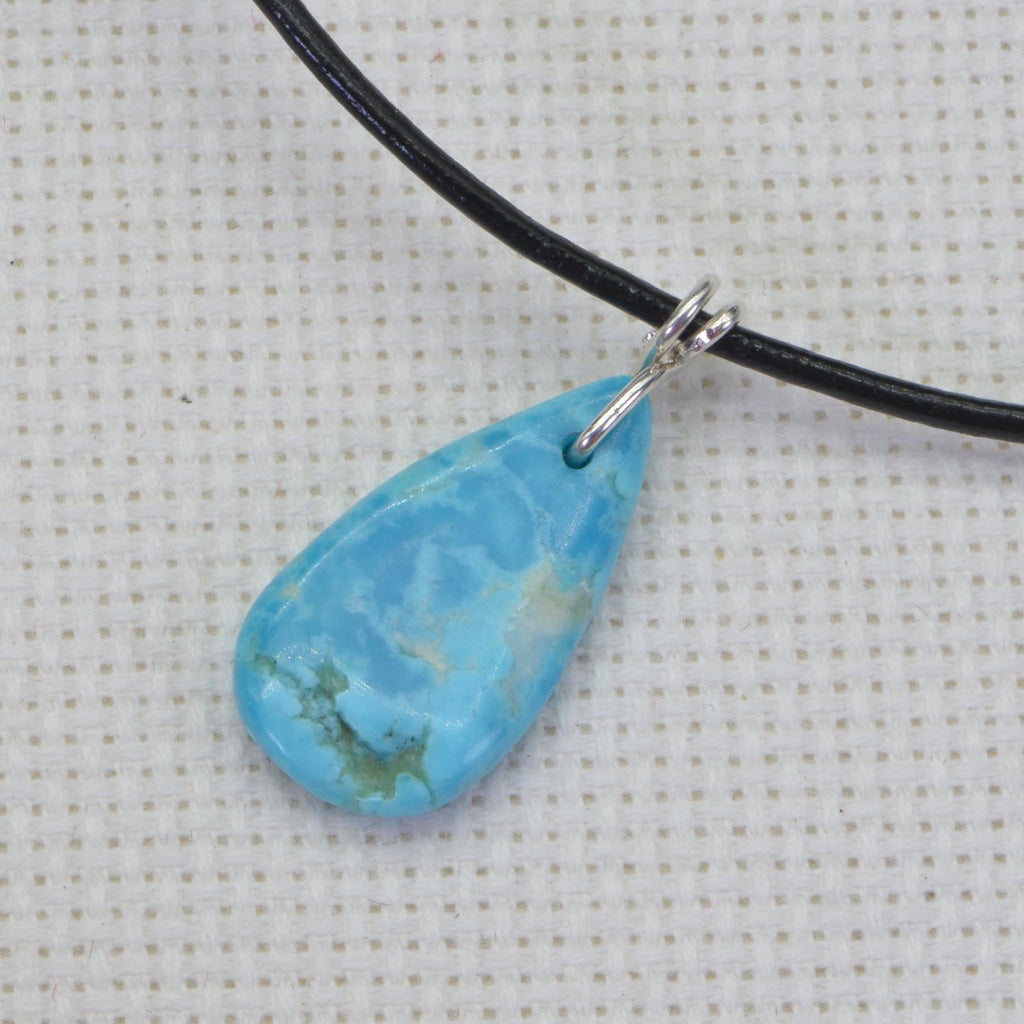 Sleeping Beauty Turquoise Pendant: Wire Wrapped Gemstone, Leather Cord