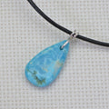 Sleeping Beauty Turquoise Pendant: Wire Wrapped Gemstone, Leather Cord