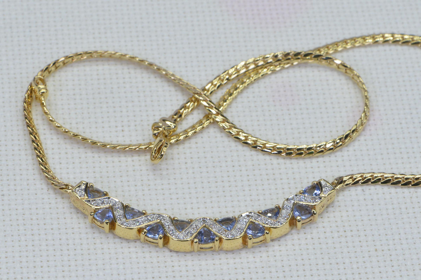 Simulated Tanzanite Necklace: 14K Gold Over Sterling Silver, Herringbone Chain