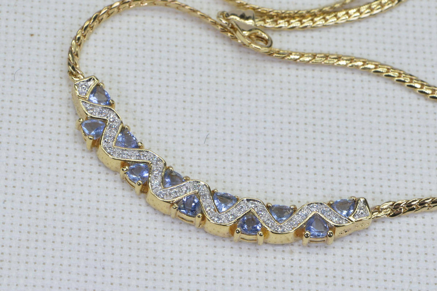 Simulated Tanzanite Necklace: 14K Gold Over Sterling Silver, Herringbone Chain