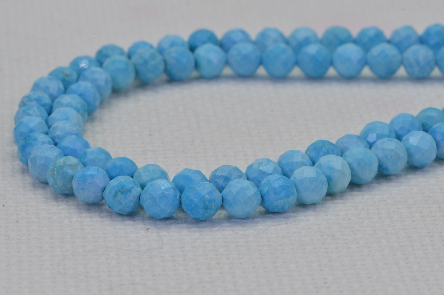Sleeping Beauty Turquoise Beads: 5mm Faceted Round, 15 Inch Strand