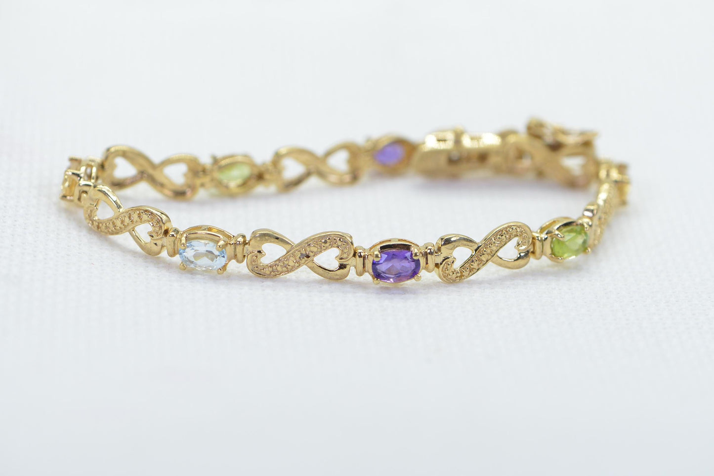 Rainbow Gemstone Tennis Bracelet: 14k Gold over Sterling Silver Infinity Design