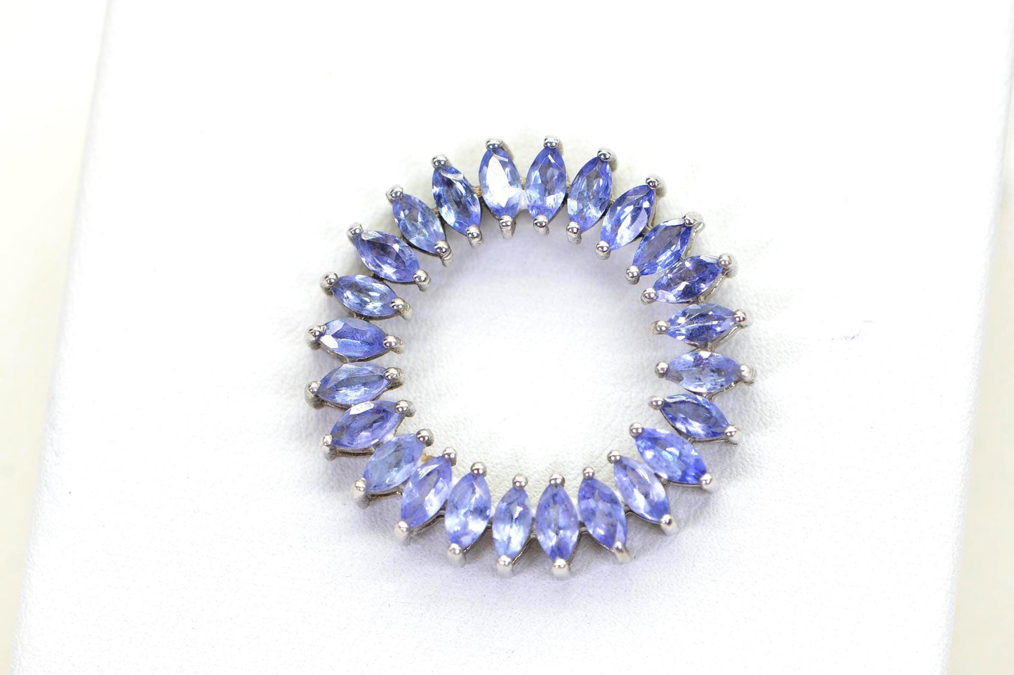 Tanzanite Circle Pendant Necklace: Sterling Silver Rhodium Finish, Floral Design