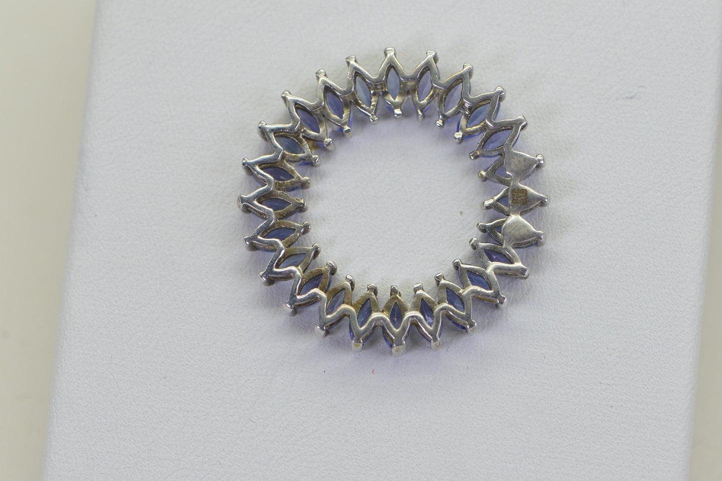 Tanzanite Circle Pendant Necklace: Sterling Silver Rhodium Finish, Floral Design