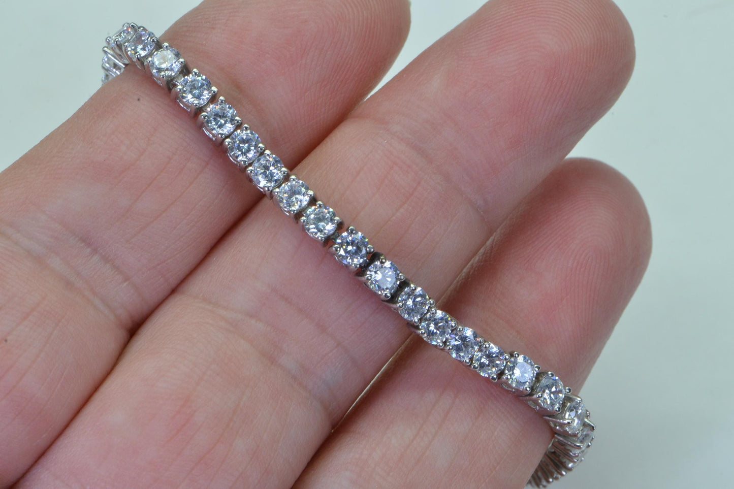 Simulated Diamond Tennis Bracelet: 14K Gold Over Sterling Silver, 7 inch