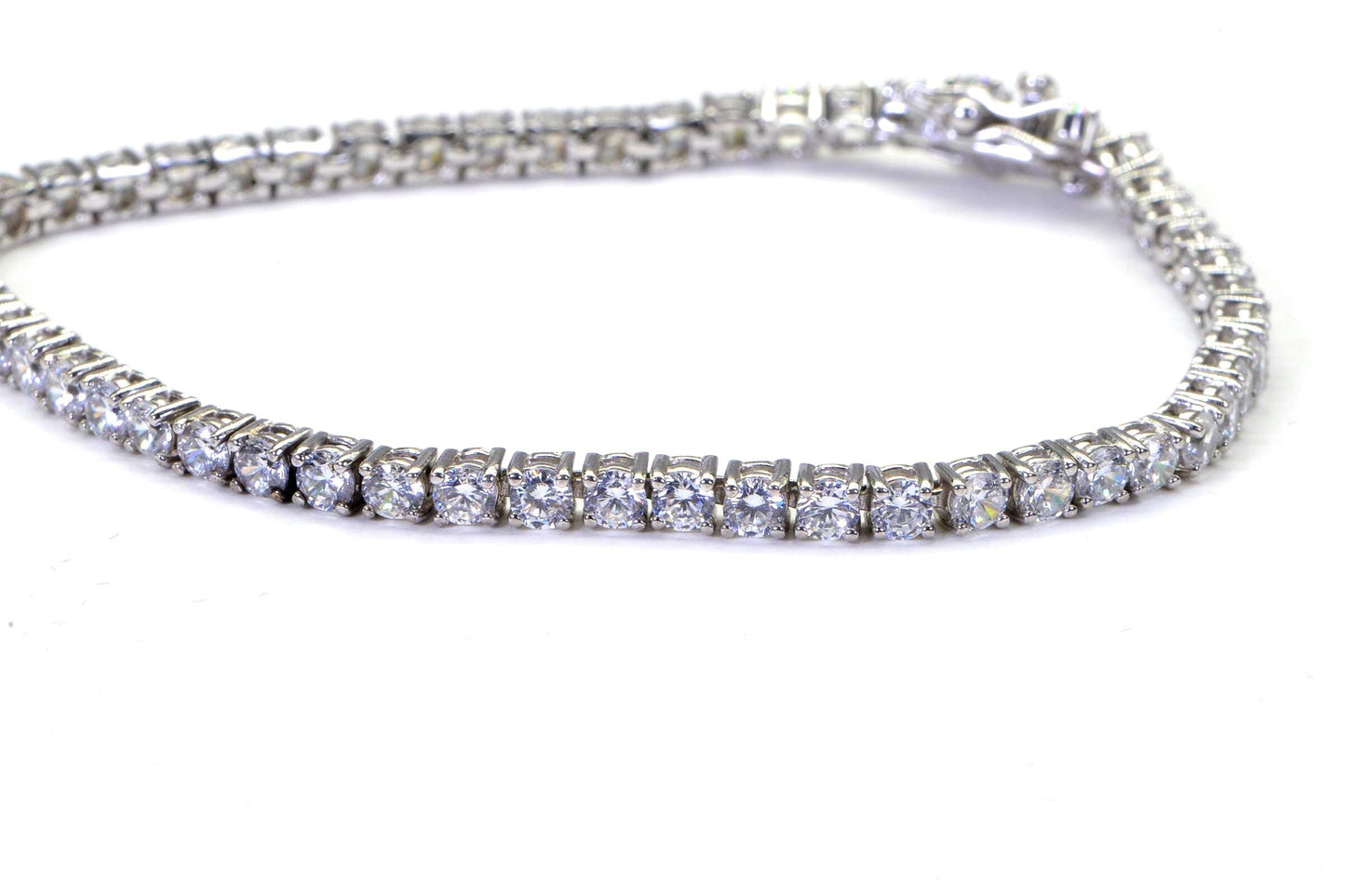 Simulated Diamond Tennis Bracelet: 14K Gold Over Sterling Silver, 7 inch