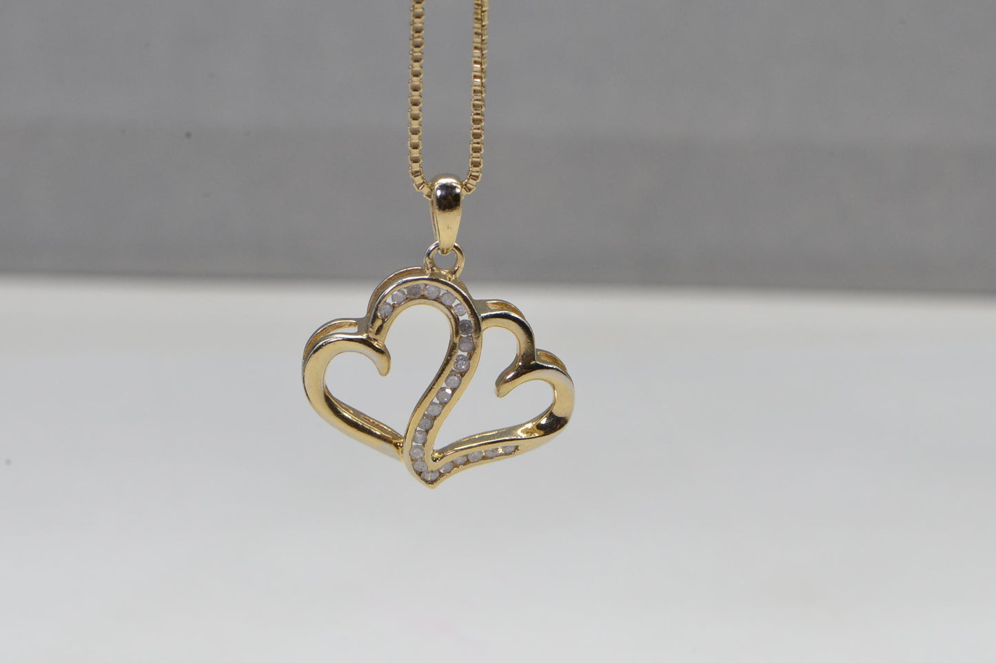Diamond Double Heart Pendant: 14K Gold Over Sterling Silver