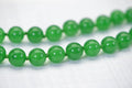 Apple Green Jadeite Knotted Necklace: 10mm Burma Jade, 26 Inch