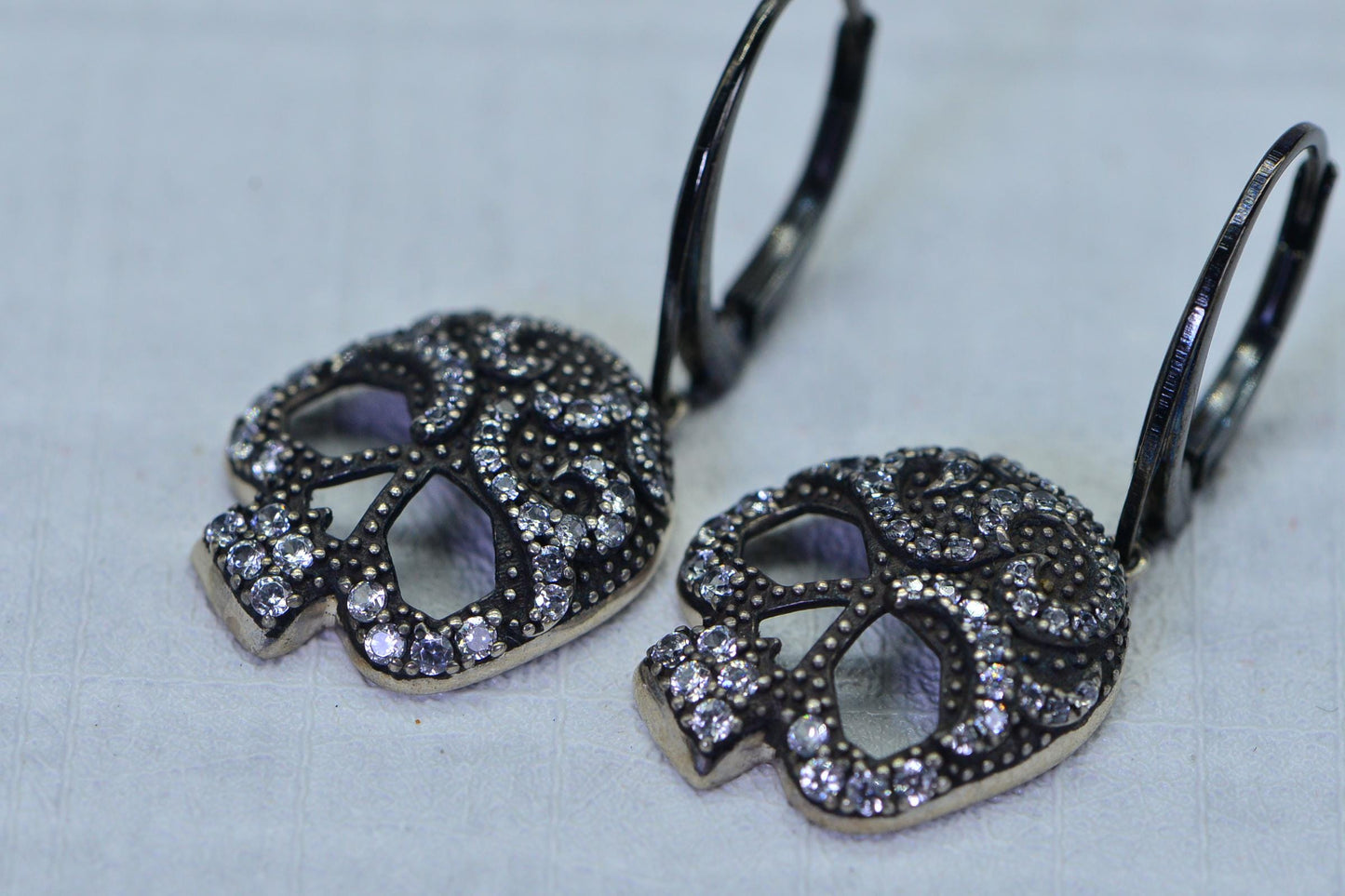 Simulated Diamond Skull Earrings – Black Gold Over Sterling Silver Dangle Earrings