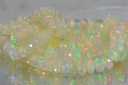 Ethiopian Opal Beads: 45.3ctw Faceted Rondelle Gemstone Strand