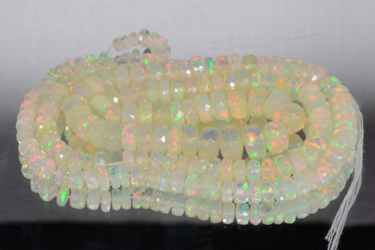 Ethiopian Opal Beads: 45.3ctw Faceted Rondelle Gemstone Strand