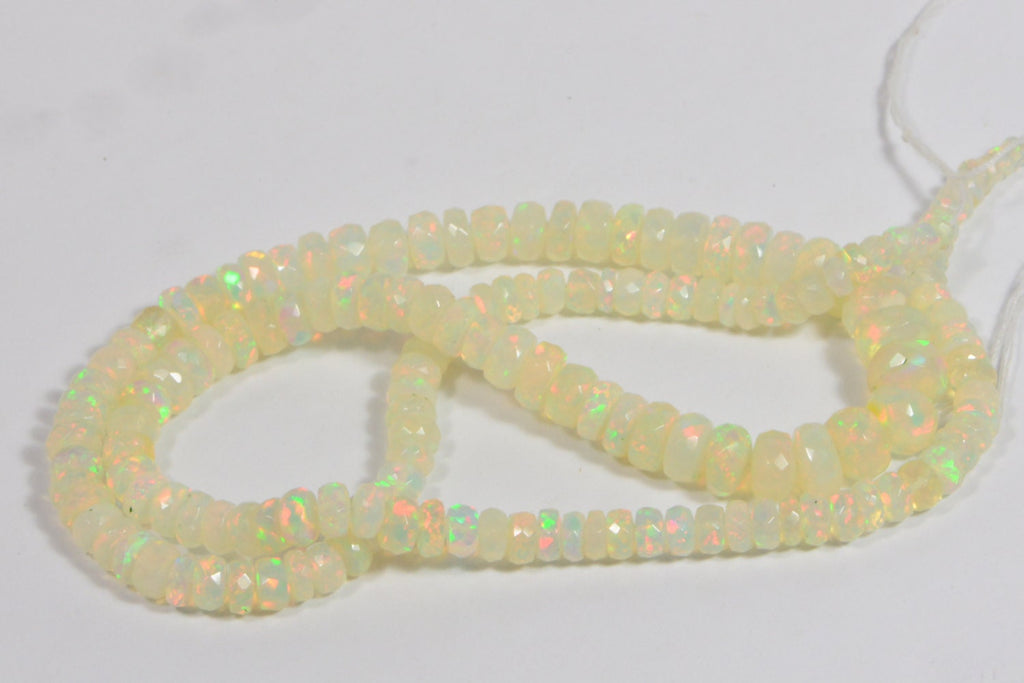 Ethiopian Opal Beads: 45.3ctw Faceted Rondelle Gemstone Strand