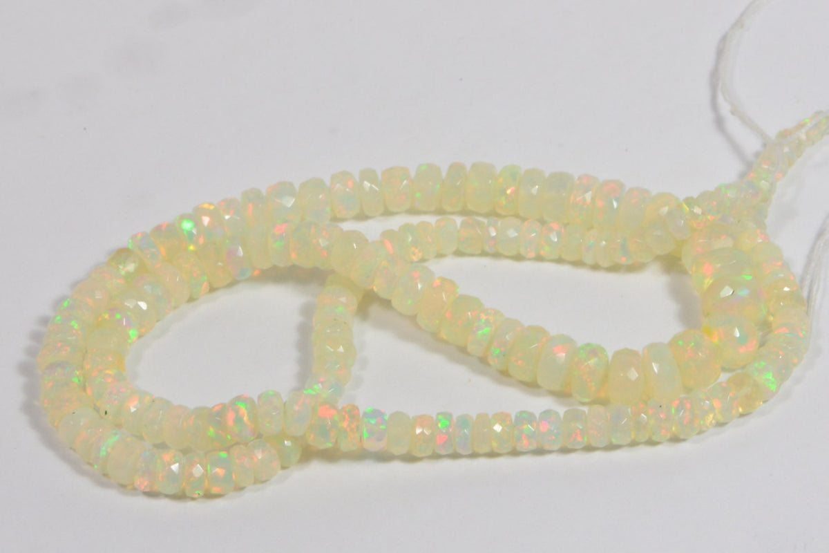 Ethiopian Opal Beads: 45.3ctw Faceted Rondelle Gemstone Strand