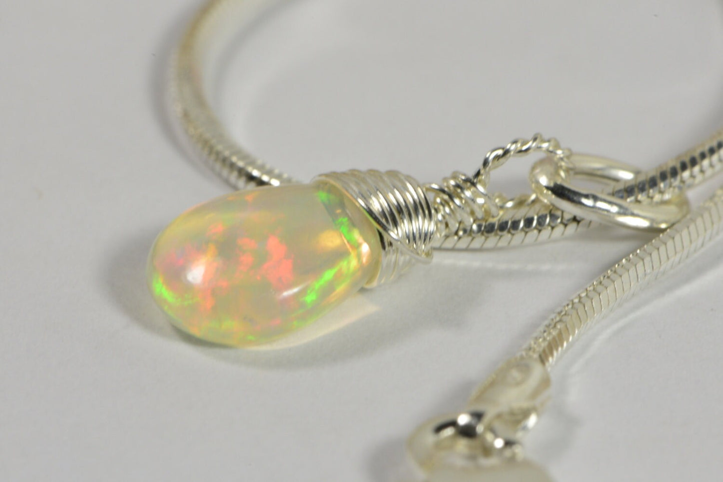Ethiopian Opal Necklace: Sterling Silver Wire Wrapped Teardrop Pendant
