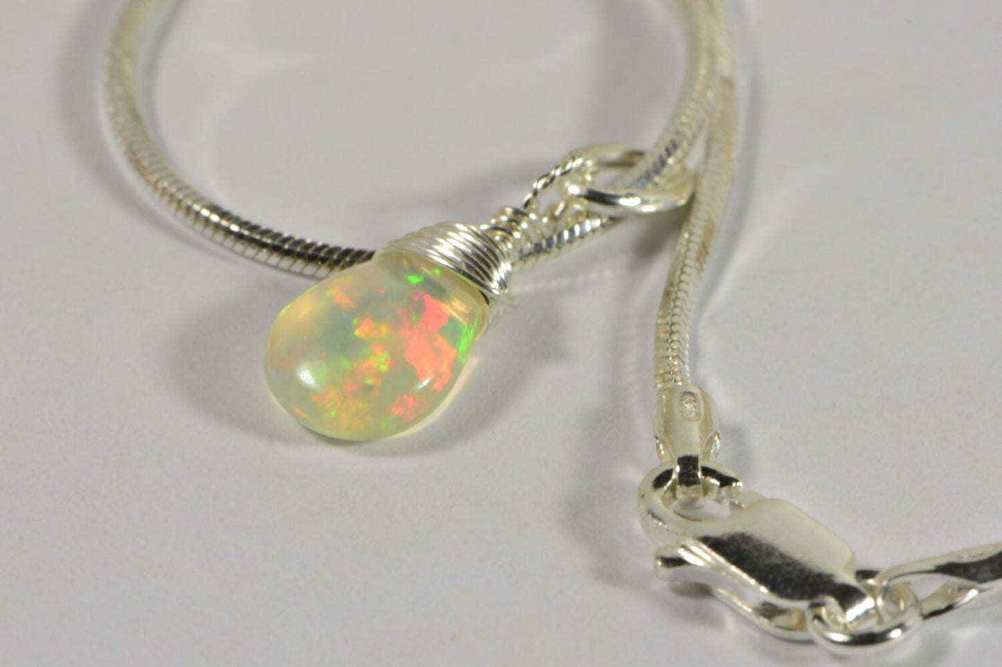 Ethiopian Opal Necklace: Sterling Silver Wire Wrapped Teardrop Pendant