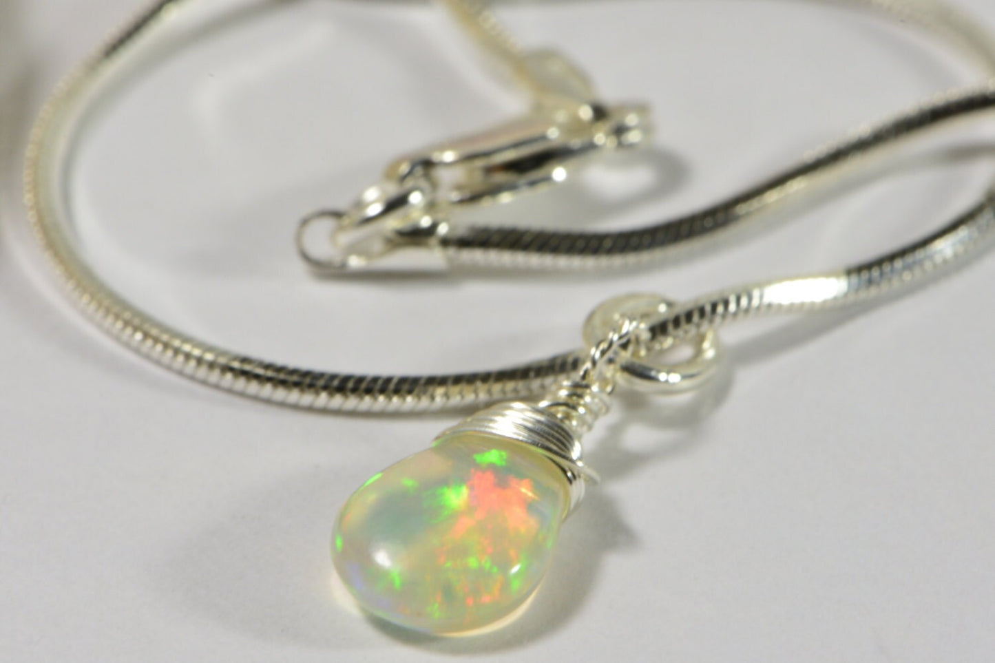 Ethiopian Opal Necklace: Sterling Silver Wire Wrapped Teardrop Pendant