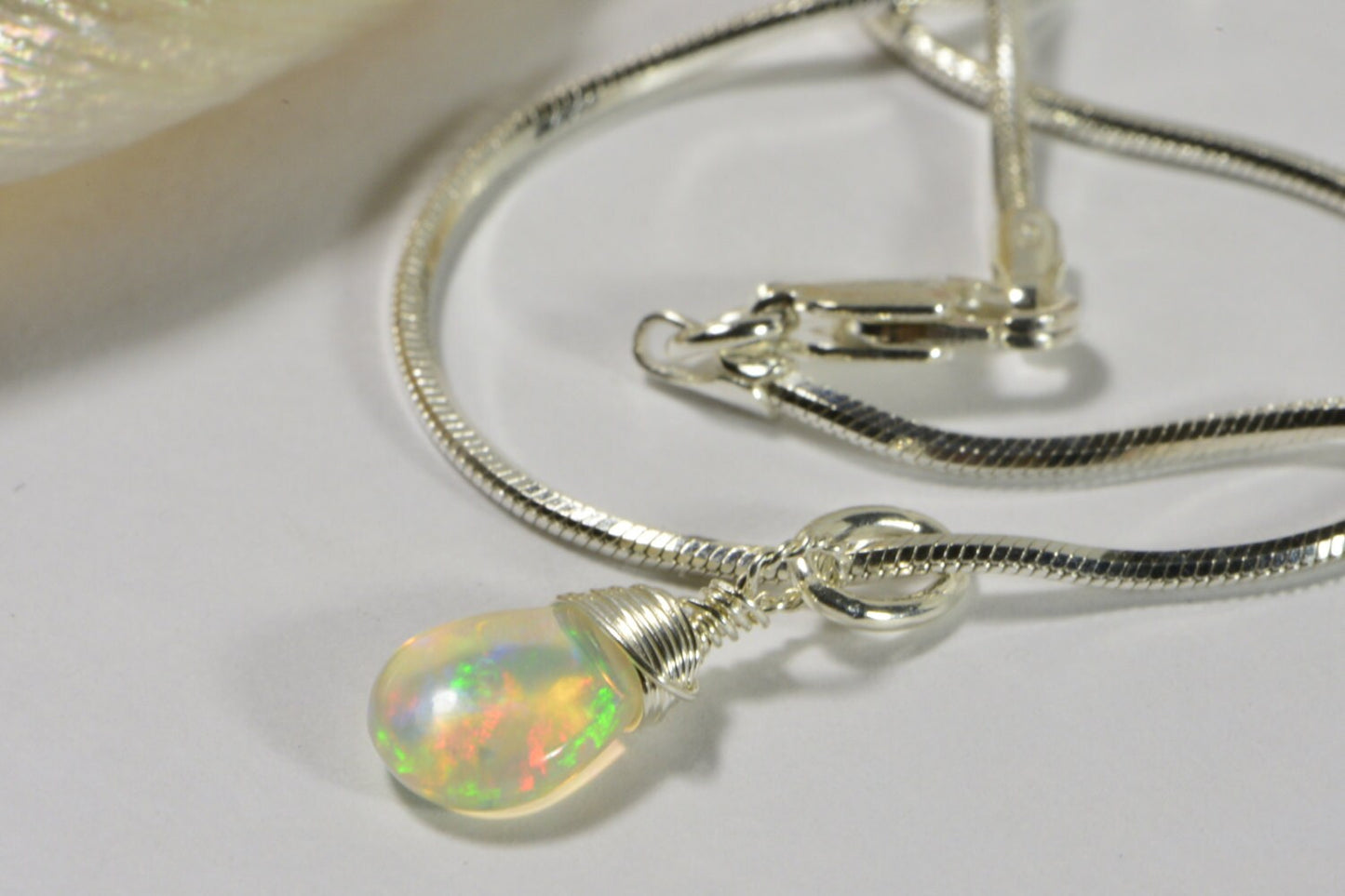 Ethiopian Opal Necklace: Sterling Silver Wire Wrapped Teardrop Pendant