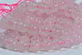 AAA Rose Quartz Beads: 10mm Round Gemstone, 15" Strand